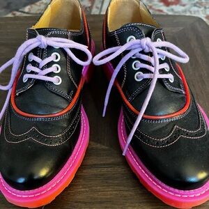 Black Fluevog Wingtip Platform Oxfords with Pink Soles and Lavender Laces